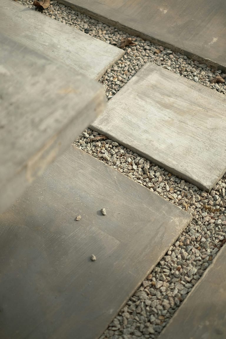 Bluestone stepping pavers set into pebble gravel